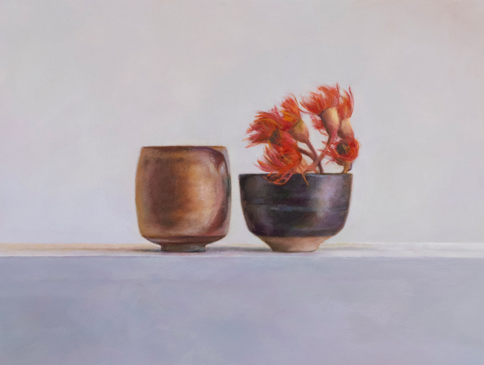 Orange shino and Pilbara ash teabowls with redgum blossom