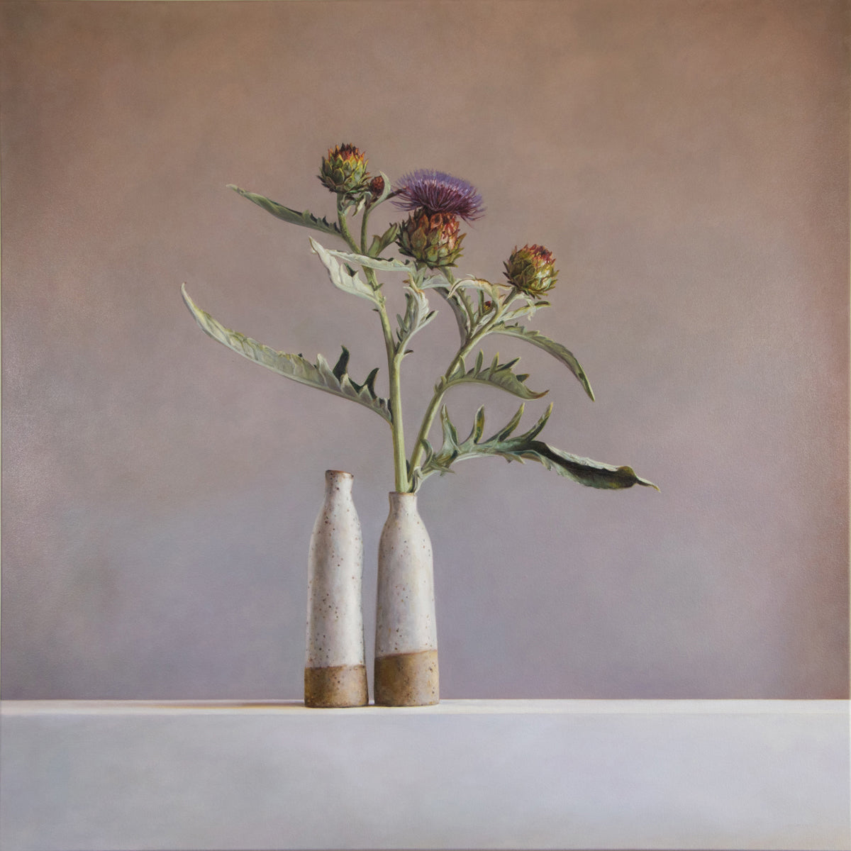 Side by side garden thistles and south coast bottles