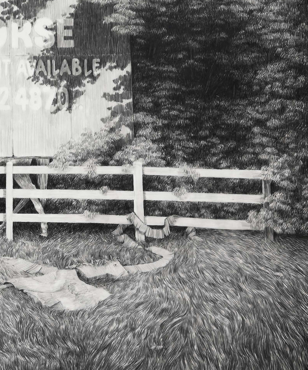 A sign, fence and horses