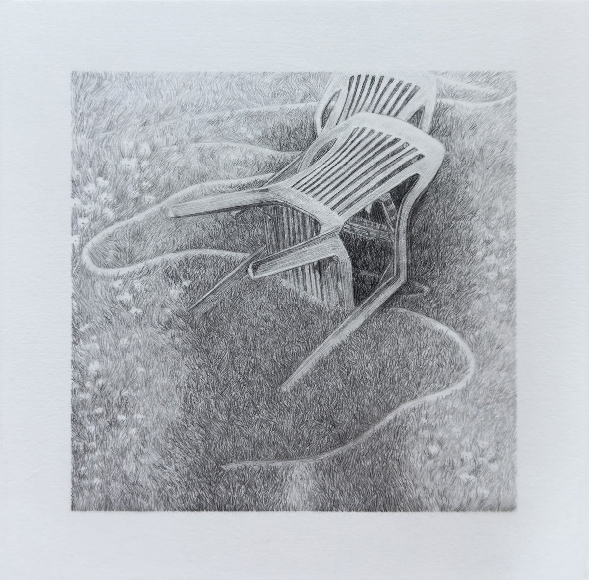 Pool chairs and a shadow