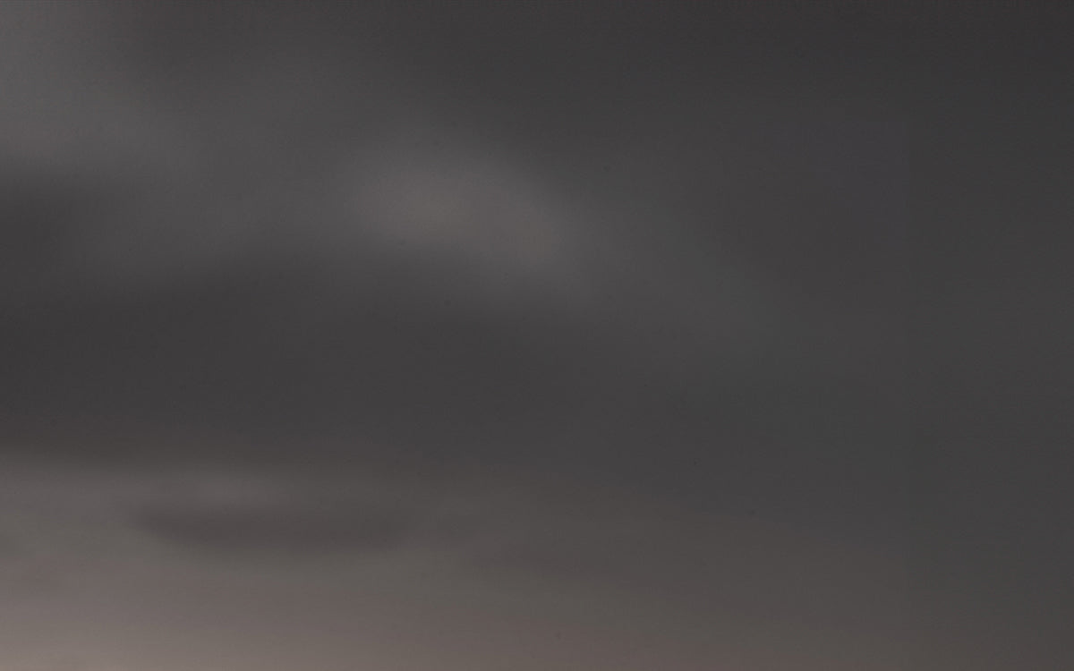 Monochrome Serenity. Rocks Clouds and Ocean Harmony