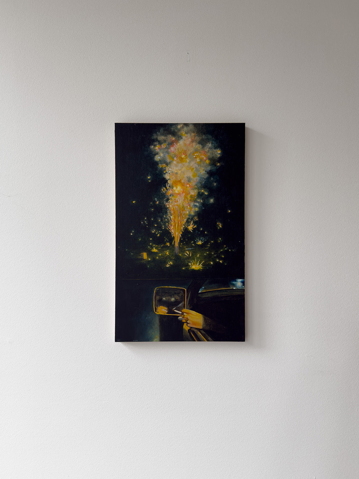 A firework, car and lights