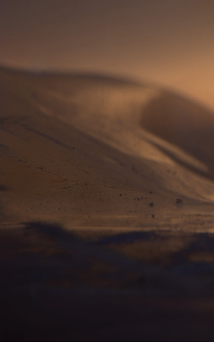 Twilight's Dance. Ocean Waves Beneath Sunset Skies